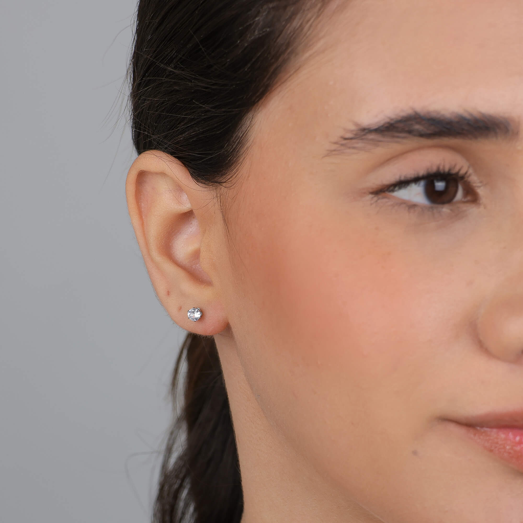 Brinco Ponto de Luz Zircônia